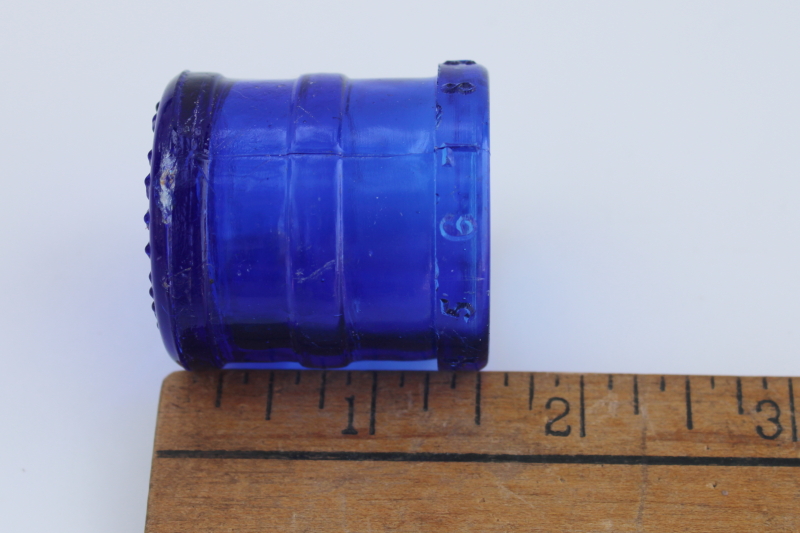 photo of antique cobalt blue glass medicine dose cup measure from Wyeth pharmacy bottle #5