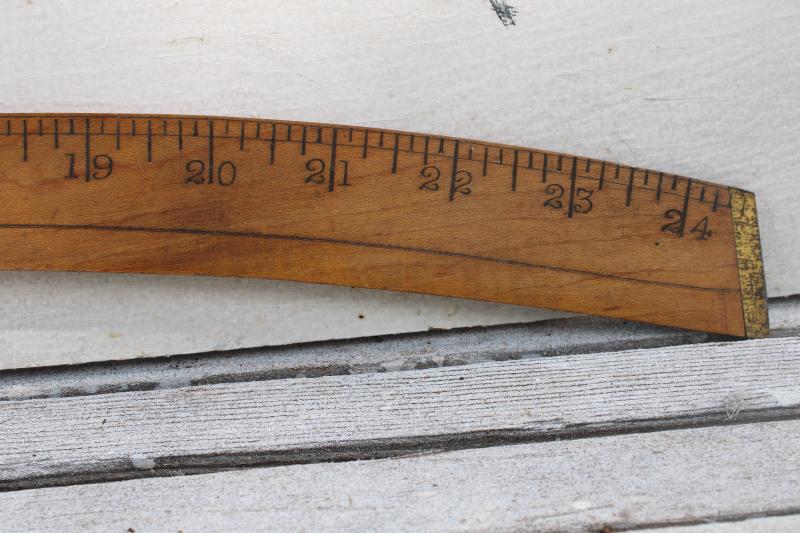 photo of antique drafting tool, brass tipped wood measure slope shape ship curve vintage industrial #1