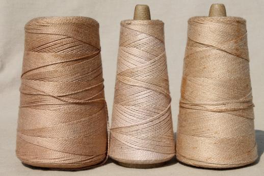 photo of antique ecru tan faded brown colors primitive grubby old spools of vintage cotton cord thread #2
