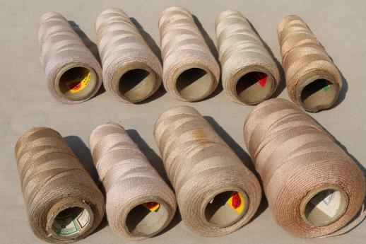 photo of antique ecru tan faded brown colors primitive grubby old spools of vintage cotton cord thread #4