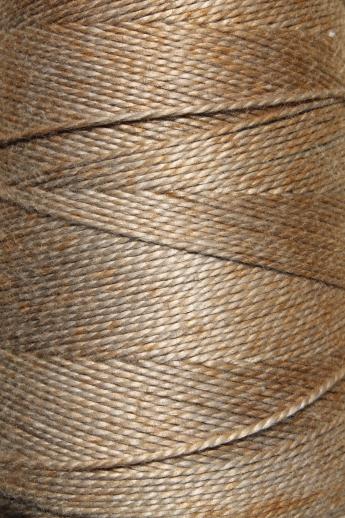photo of antique ecru tan faded brown colors primitive grubby old spools of vintage cotton cord thread #6