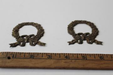 catalog photo of antique embossed brass hardware, wreath decorative appliques, furniture or frame ornaments