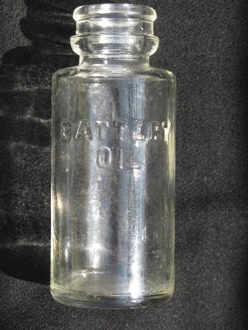 photo of antique embossed glass Edison Battery Oil bottles, machine age vintage #2