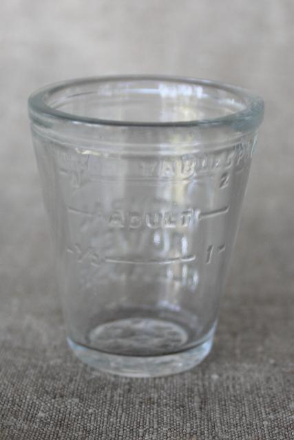 photo of antique embossed measure glass medicine dose cup, Adlerika quack remedy bowel cure #2