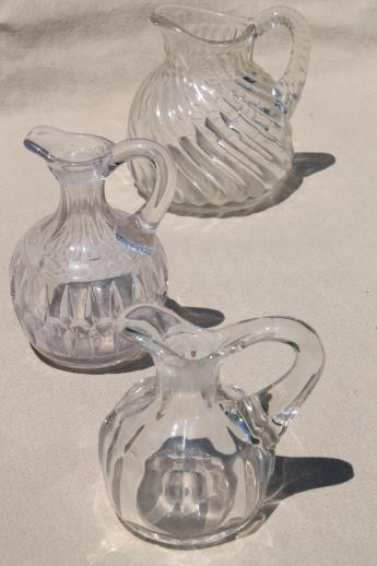 photo of antique flint glass cruet bottles, heavy old glass pitchers w/ pontil marks #1