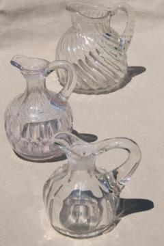 catalog photo of antique flint glass cruet bottles, heavy old glass pitchers w/ pontil marks