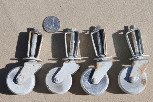 photo of antique furniture casters w/ wood wheels, vintage wooden wheel casters w/ white paint lot of 2 sets #2