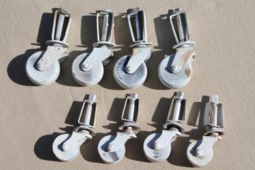 catalog photo of antique furniture casters w/ wood wheels, vintage wooden wheel casters w/ white paint lot of 2 sets