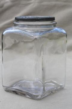 catalog photo of antique glass jar, old store counter canister or butter churn square gallon jar