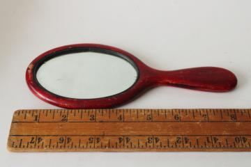 antique hand mirror, beveled edge oval looking glass in early 1900s vintage wood frame 