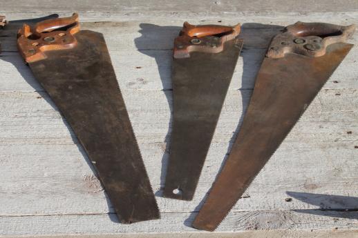 photo of antique hand saws, lot of Henry Disston saws 1860s medallion thumbhole handle #2