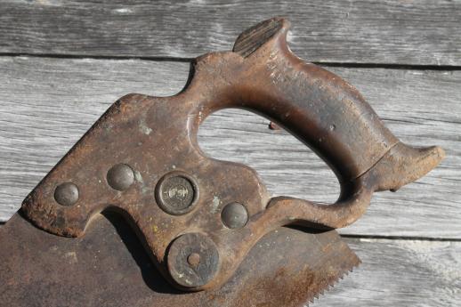 photo of antique hand saws, lot of Henry Disston saws 1860s medallion thumbhole handle #11