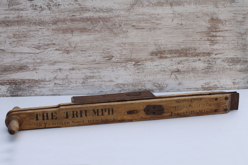 photo of antique hand tool corn planter Janesville Wisconsin Pumpkin Seed planter old farm garden planting seeder  #1
