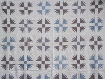 catalog photo of antique hand-stitched sawtooth wheel quilt, vintage blue and grey on white