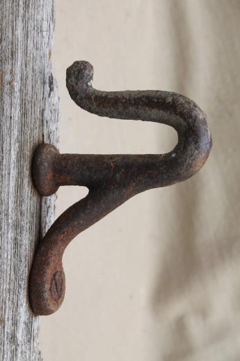 photo of antique horse harness hooks on salvage barn wood, rustic architectural hardware #4