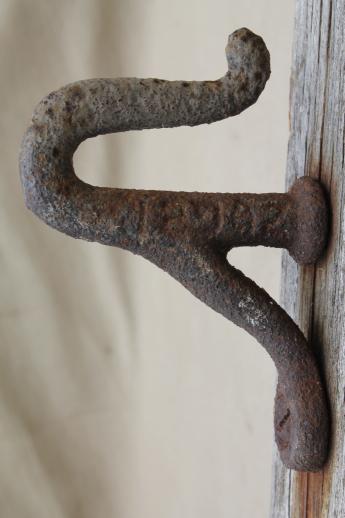 photo of antique horse harness hooks on salvage barn wood, rustic architectural hardware #5