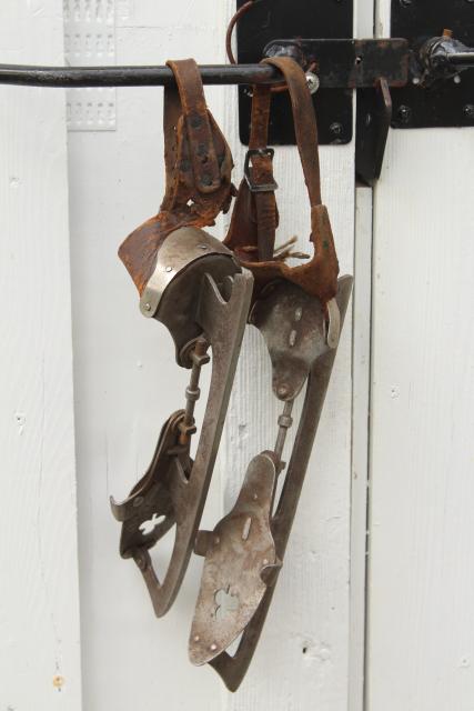 photo of antique ice skates w/ leather straps, marked Union Hardware early 1900s vintage  #1