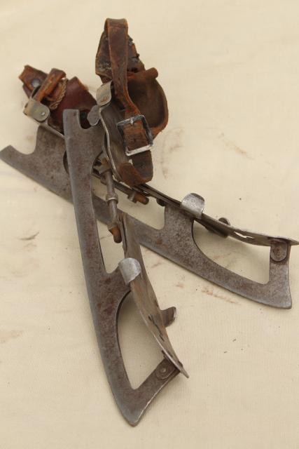 photo of antique ice skates w/ leather straps, marked Union Hardware early 1900s vintage  #3