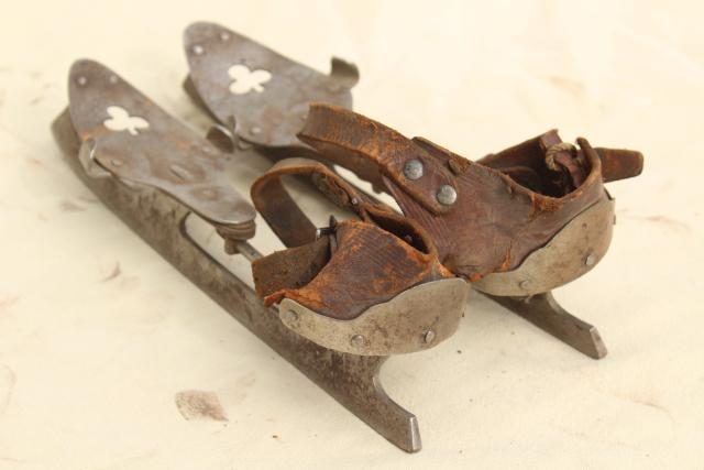 photo of antique ice skates w/ leather straps, marked Union Hardware early 1900s vintage  #10