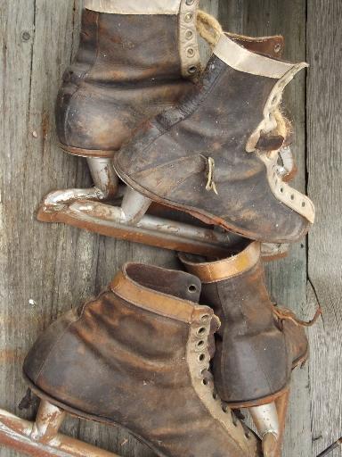 photo of antique ice skates, vintage leather boots hockey skates for display #2