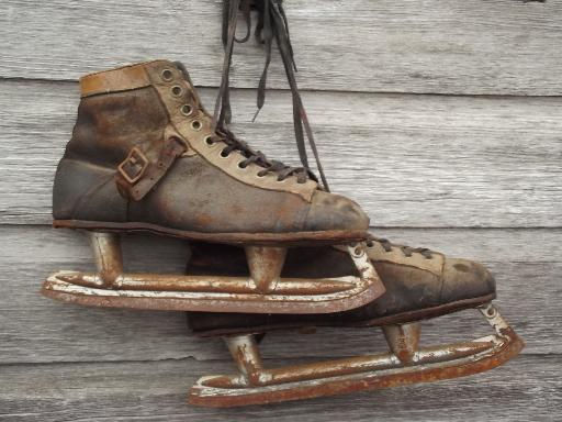 photo of antique ice skates, vintage leather boots hockey skates for display #3