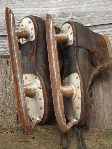 photo of antique ice skates, vintage leather boots hockey skates for display #6