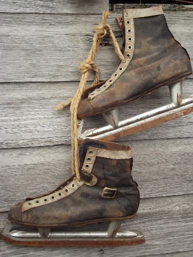 photo of antique ice skates, vintage leather boots hockey skates for display #9