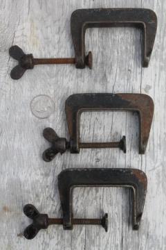 catalog photo of antique iron C clamps, small tool workbench clamps or cabinetmaker woodworking clamps