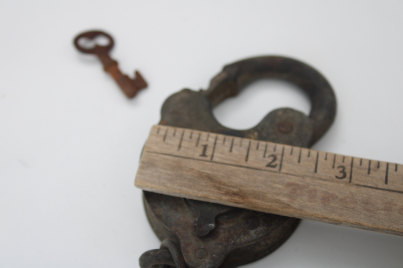 photo of antique iron padlock w/ chain, brass cover keyhole working lock w/ key F B & Co 1800s vintage #7
