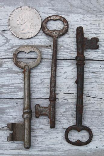 photo of antique key collection, lot of vintage skeleton keys, gate keys, old door lock keys #2