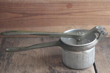 catalog photo of antique kitchen tool, potato ricer King Cincinnati galvanized sieve w/ embossed cast iron handle
