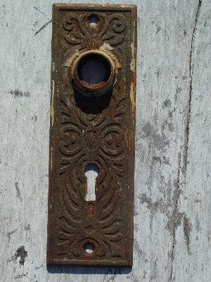 photo of antique ornate arts and crafts doorknob plates #2