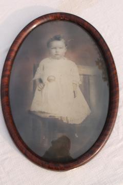 catalog photo of antique oval domed convex glass picture frame w/ vintage photo portrait baby long white dress