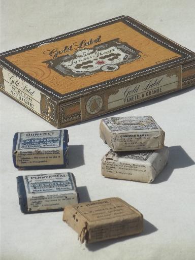 photo of antique paper packets of medicinal herbs w/ old pharmacy medicine labels #1