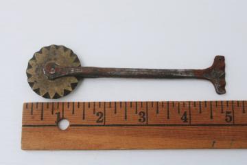 catalog photo of antique pie crimper, solid brass wheel w/ iron handle, 1800s vintage kitchen tool 