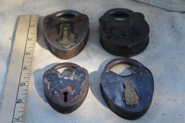 photo of antique railroad locks, iron padlocks w/ brass lock cover, primitive heart shape #2