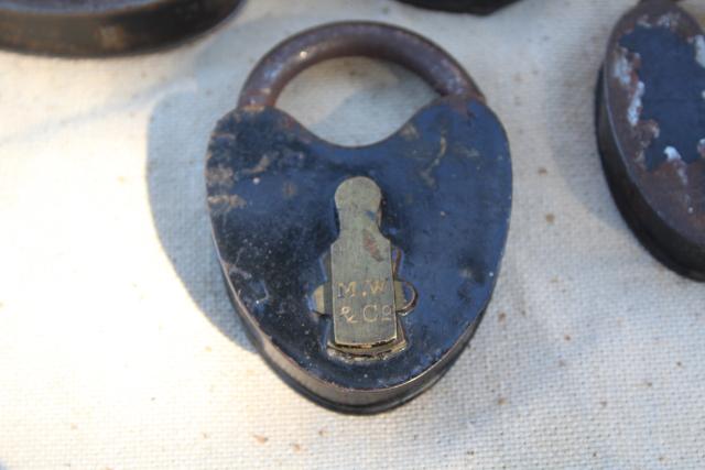 photo of antique railroad locks, iron padlocks w/ brass lock cover, primitive heart shape #4