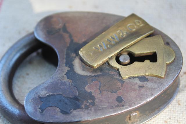 photo of antique railroad locks, iron padlocks w/ brass lock cover, primitive heart shape #10