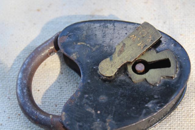 photo of antique railroad locks, iron padlocks w/ brass lock cover, primitive heart shape #11