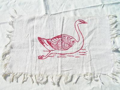 photo of antique redwork embroidery over towel #1