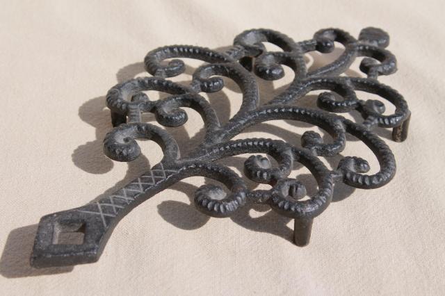 photo of antique reproduction cast iron trivet collection, John Wright / Wilton Wrightsville trivets #2