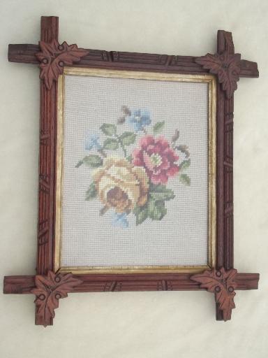 photo of antique roses wool needlepoint in rustic Adirondack carved wood frame #1