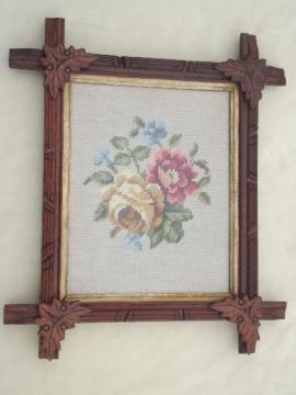 catalog photo of antique roses wool needlepoint in rustic Adirondack carved wood frame