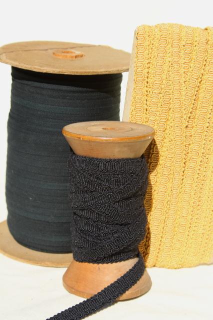 photo of antique sewing millinery trim, big spools of black & gold braid, cotton twill tape #1