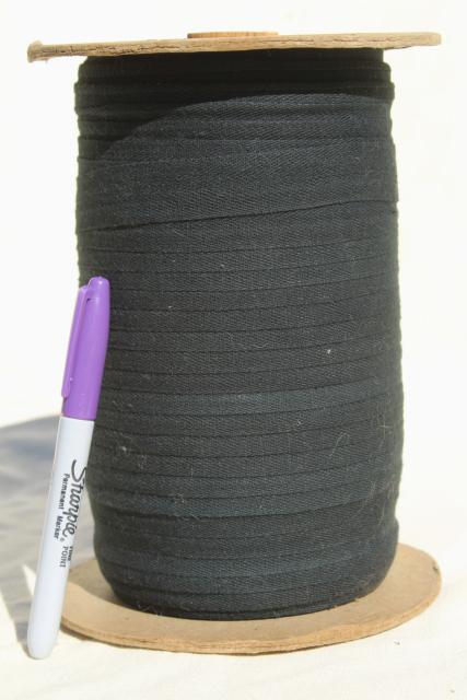 photo of antique sewing millinery trim, big spools of black & gold braid, cotton twill tape #7