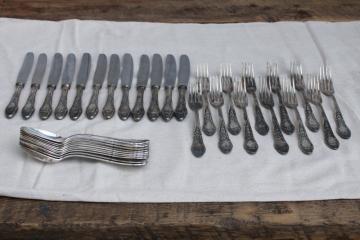 catalog photo of antique silver plate flatware, turn of the century Germany large heavy ornate spoons, dinner forks, knives 