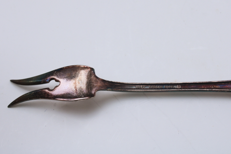 photo of antique silver plate pickle fork, fancy ornate serving fork w/ pierced handle 1847 Rogers Old Colony #3