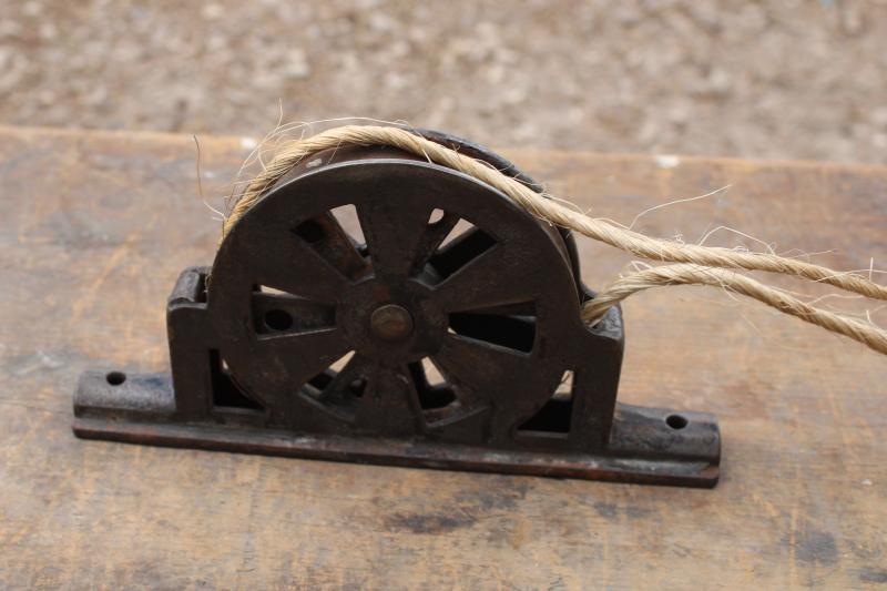 photo of antique steel pulley, vintage industrial style window or door lift hardware #2