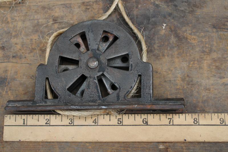 photo of antique steel pulley, vintage industrial style window or door lift hardware #4