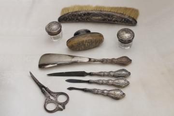 catalog photo of antique sterling silver dressing table set, vanity set jars, brush, scissors etc